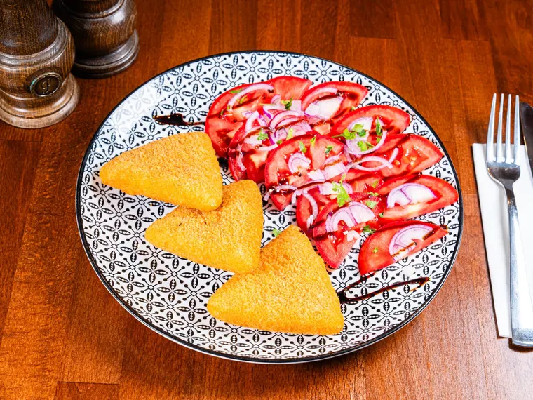 A plate of breaded cheese, at Ciorbe La Ion