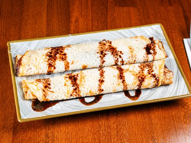A plate of pancakes with finetti (2 pcs), at Ciorbe La Ion