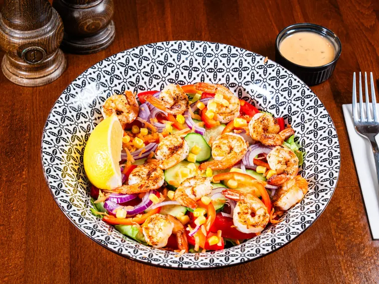 A plate of salad with prawns, at Ciorbe La Ion